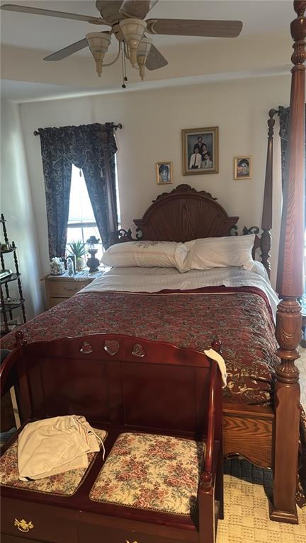 bedroom featuring ceiling fan