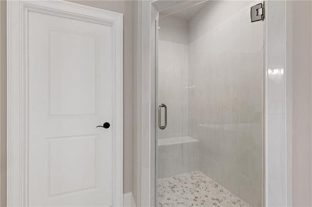 bathroom with an enclosed shower