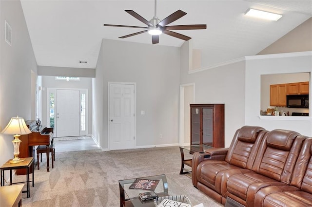 living area with ceiling fan, light carpet, high vaulted ceiling, baseboards, and visible vents