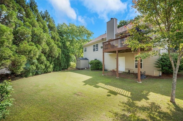 view of yard featuring a wooden deck