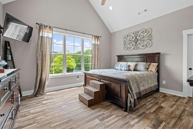 1423 Hillcrest Rd, Bowdon, GA 30108 - bedroom featuring light wood-type flooring, baseboards, high vaulted ceiling, a ceiling fan, and recessed lighting