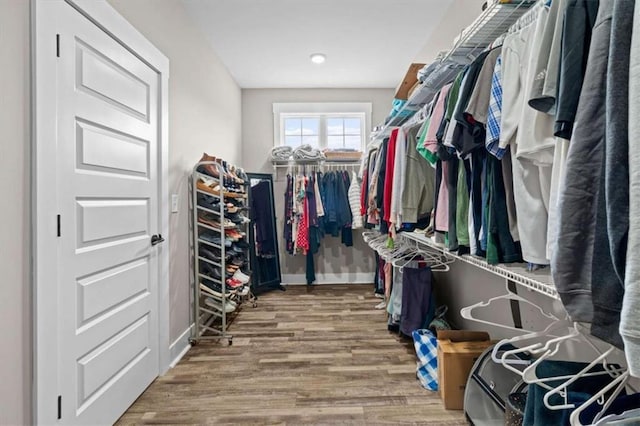 1423 Hillcrest Rd, Bowdon, GA 30108 - spacious closet with wood finished floors