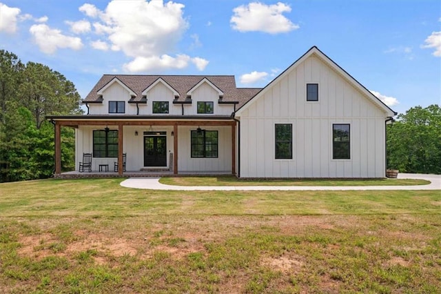 1423 Hillcrest Rd, Bowdon, GA 30108 - modern farmhouse with board and batten siding, a front lawn, and a porch