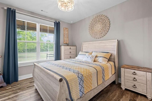 1423 Hillcrest Rd, Bowdon, GA 30108 - bedroom featuring baseboards and dark wood finished floors