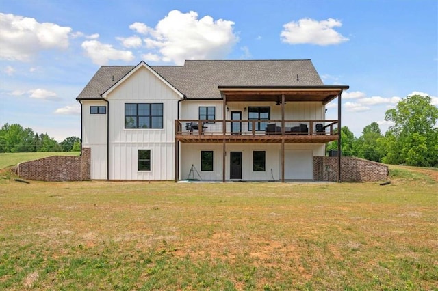1423 Hillcrest Rd, Bowdon, GA 30108 - back of property featuring a garage, a yard, a deck, and a shingled roof