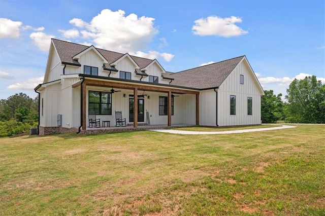 1423 Hillcrest Rd, Bowdon, GA 30108 - modern inspired farmhouse with board and batten siding, ceiling fan, a front lawn, a patio area, and roof with shingles