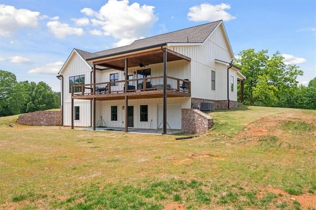 1423 Hillcrest Rd, Bowdon, GA 30108 - rear view of house with a lawn, ceiling fan, a wooden deck, central AC, and a patio area