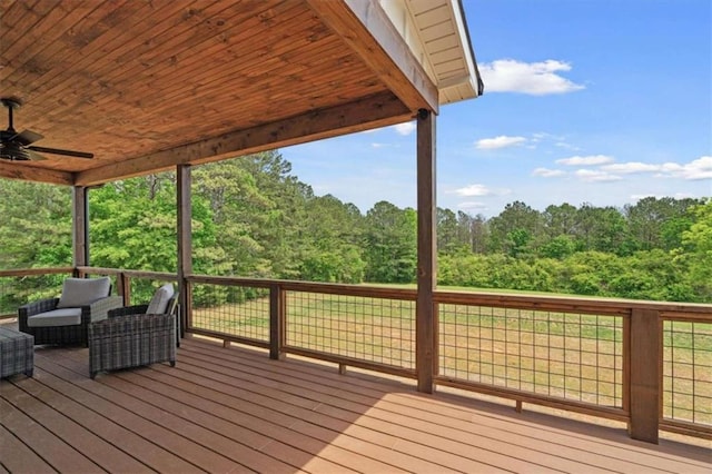 1423 Hillcrest Rd, Bowdon, GA 30108 - wooden deck with ceiling fan and a forest view