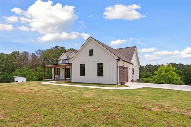 1423 Hillcrest Rd, Bowdon, GA 30108 - view of front facade featuring concrete driveway, a front yard, and an attached garage