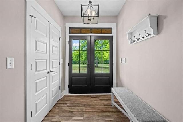 1423 Hillcrest Rd, Bowdon, GA 30108 - doorway featuring french doors, dark wood-style flooring, and a chandelier