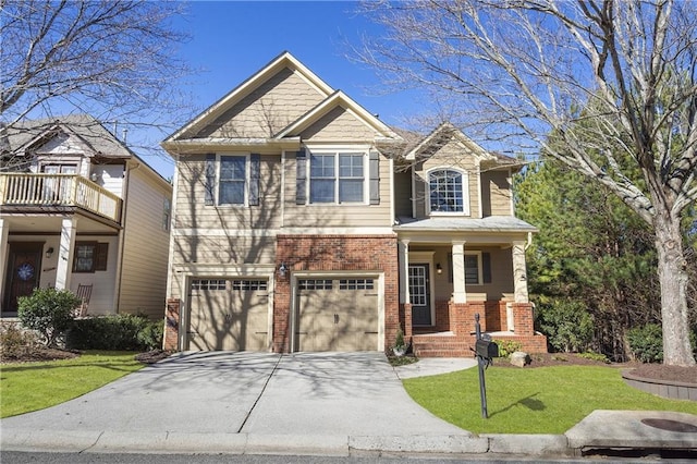 view of front of home with a garage and a front lawn