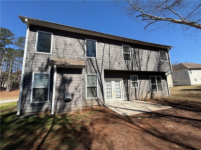 2728 Sandalwood Cir, Locust Grove, GA 30248 - back of property with a patio area