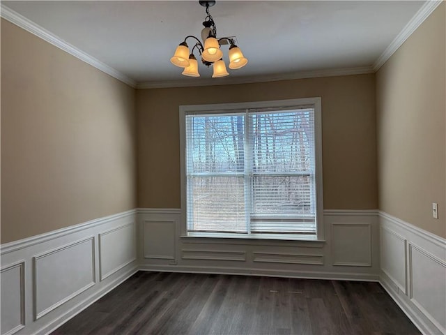 2728 Sandalwood Cir, Locust Grove, GA 30248 - unfurnished dining area with a chandelier, a wainscoted wall, dark wood-type flooring, and ornamental molding