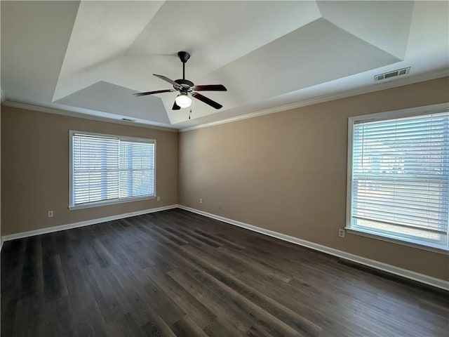 2728 Sandalwood Cir, Locust Grove, GA 30248 - spare room with visible vents, a raised ceiling, ornamental molding, and a ceiling fan