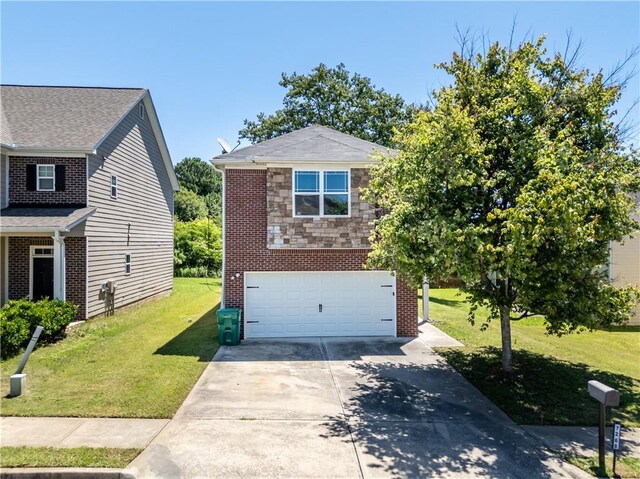 7268 Loblolly Ln, Morrow, GA 30260 - view of front of property featuring concrete driveway, a garage, and a front yard