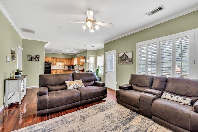 422 Inwood Trl, Lawrenceville, GA 30043 - living area featuring a ceiling fan, dark wood-style floors, baseboards, ornamental molding, and recessed lighting