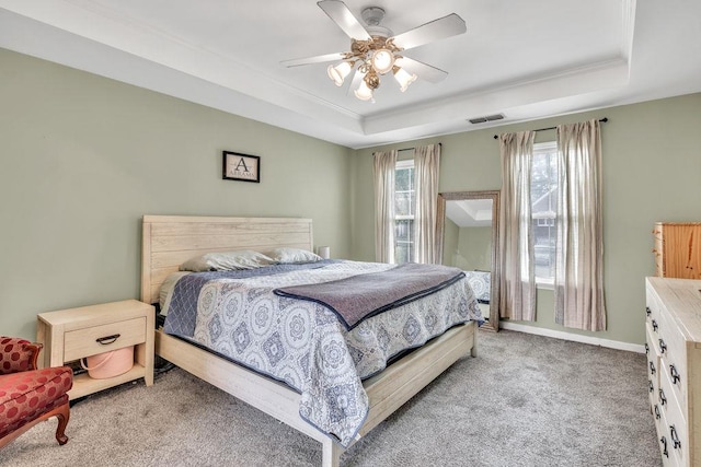 422 Inwood Trl, Lawrenceville, GA 30043 - bedroom featuring a tray ceiling, light carpet, ceiling fan, and baseboards