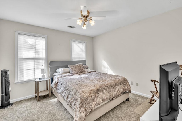 422 Inwood Trl, Lawrenceville, GA 30043 - carpeted bedroom featuring baseboards and ceiling fan