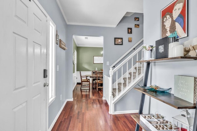 422 Inwood Trl, Lawrenceville, GA 30043 - foyer featuring crown molding, stairs, hardwood / wood-style flooring, baseboards, and plenty of natural light