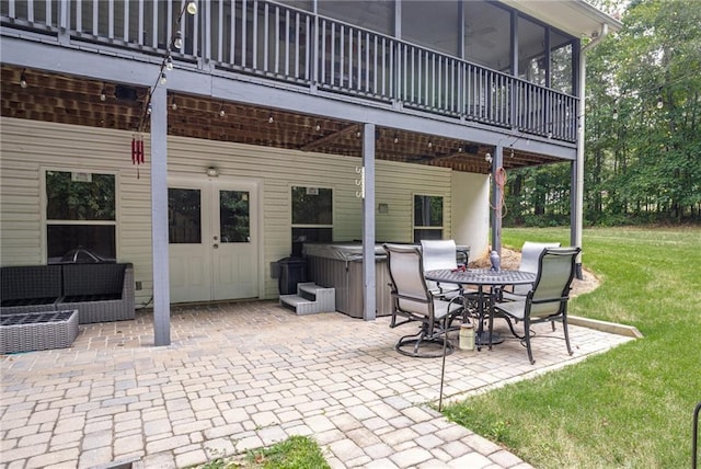 view of patio / terrace featuring a hot tub