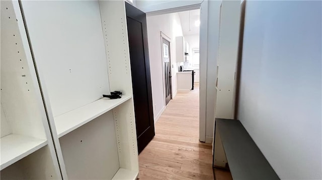 hallway featuring light wood-type flooring