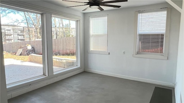 empty room featuring ceiling fan