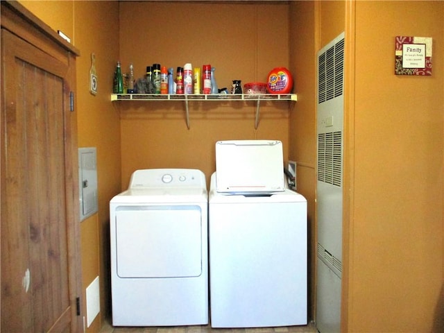 laundry room with washing machine and dryer