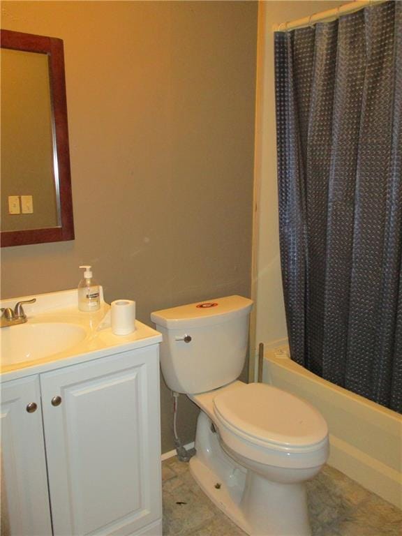 full bathroom with vanity, toilet, and shower / tub combo