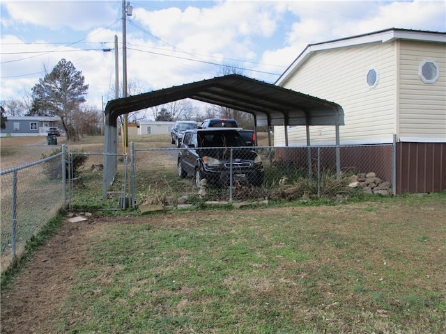 view of yard featuring a carport