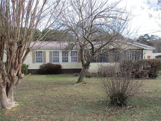 view of property exterior featuring a yard