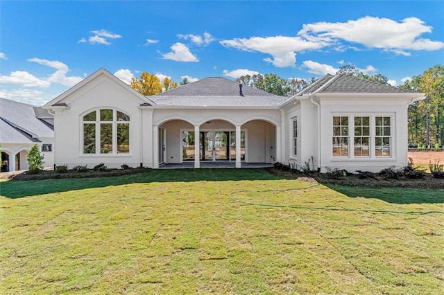 view of front of home with a front yard