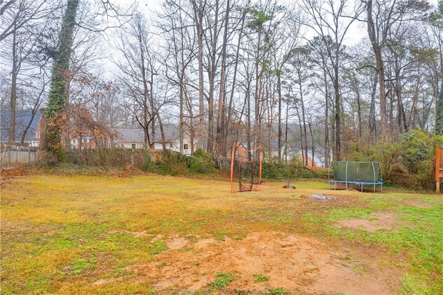 view of yard with a trampoline