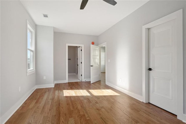 unfurnished bedroom with light hardwood / wood-style floors and ceiling fan