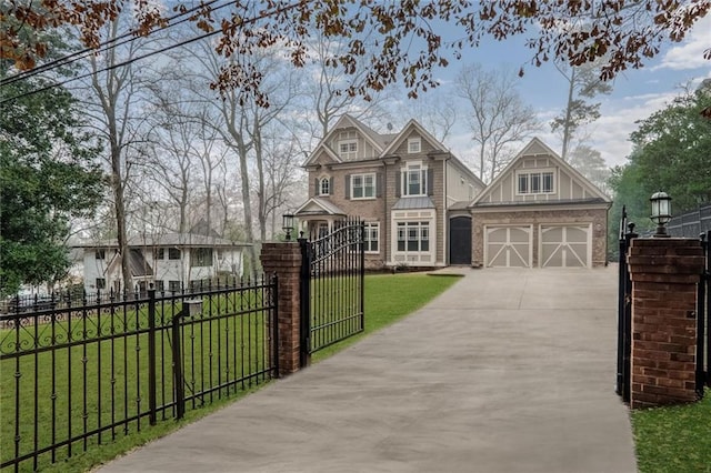 view of front of property with a front lawn, a fenced front yard, concrete driveway, a garage, and a gate