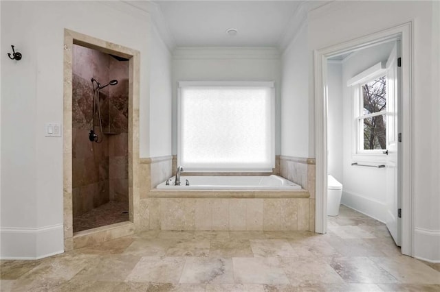 bathroom with a bath, a stall shower, toilet, and ornamental molding