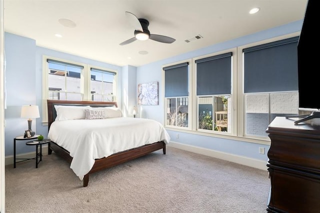 bedroom featuring ceiling fan, recessed lighting, visible vents, baseboards, and carpet