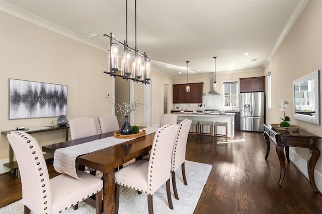 dining space with baseboards, ornamental molding, dark wood-type flooring, and recessed lighting