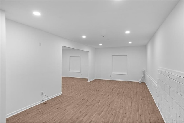 spare room with light hardwood / wood-style floors