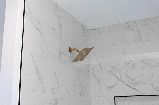 room details with a tile shower