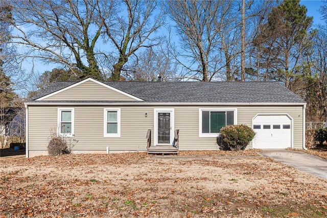 single story home with a garage