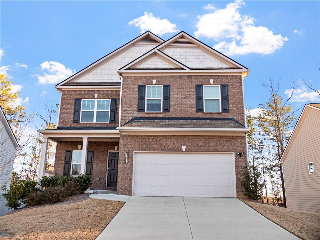 craftsman-style home with a garage