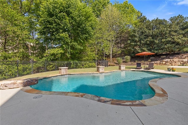 view of pool with a fenced in pool, a patio area, and fence