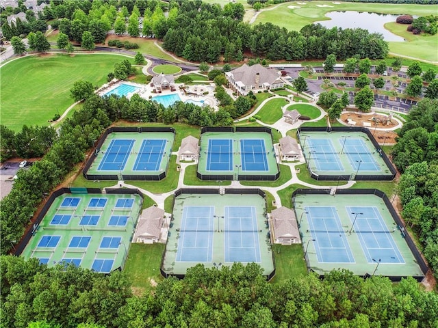birds eye view of property featuring a water view and golf course view