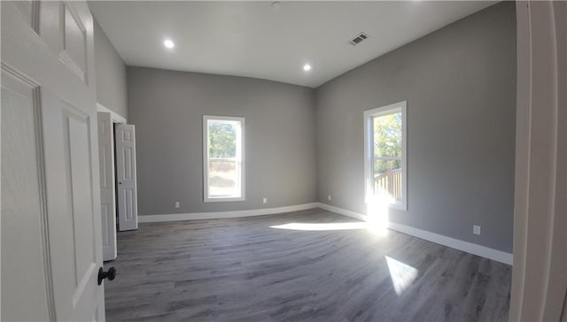 empty room featuring dark hardwood / wood-style floors