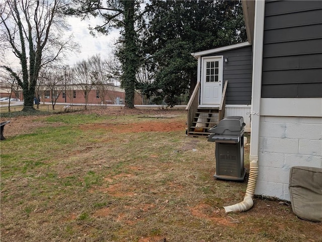 view of yard with entry steps