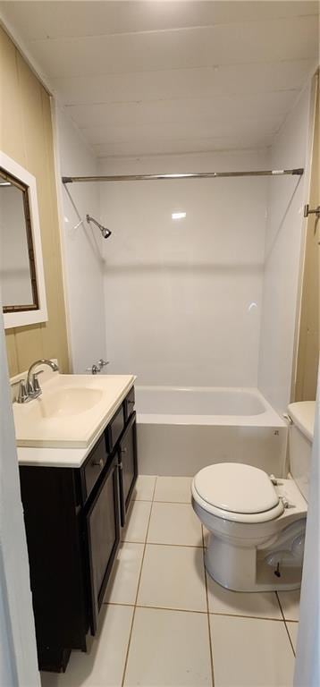 bathroom featuring  shower combination, vanity, tile patterned flooring, and toilet