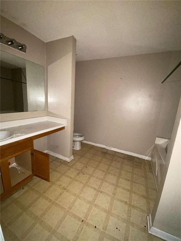 full bathroom featuring toilet, shower with separate bathtub, and vanity