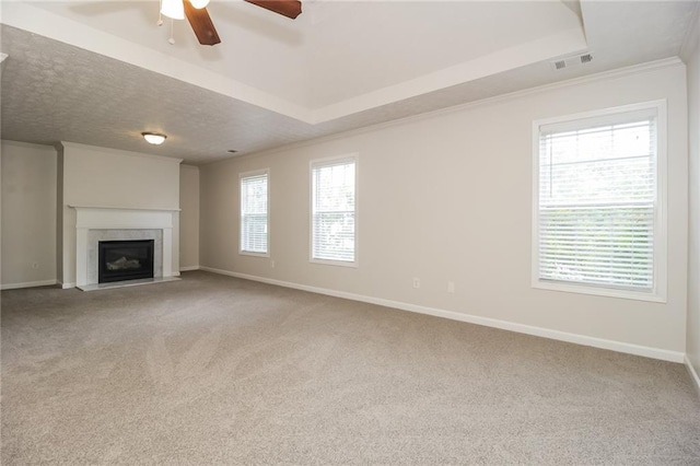 194 Wilhelmina Dr, Austell, GA 30168 - unfurnished living room with a ceiling fan, baseboards, carpet floors, and crown molding