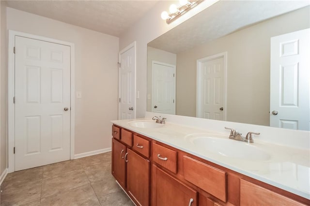 194 Wilhelmina Dr, Austell, GA 30168 - full bathroom featuring double vanity and baseboards