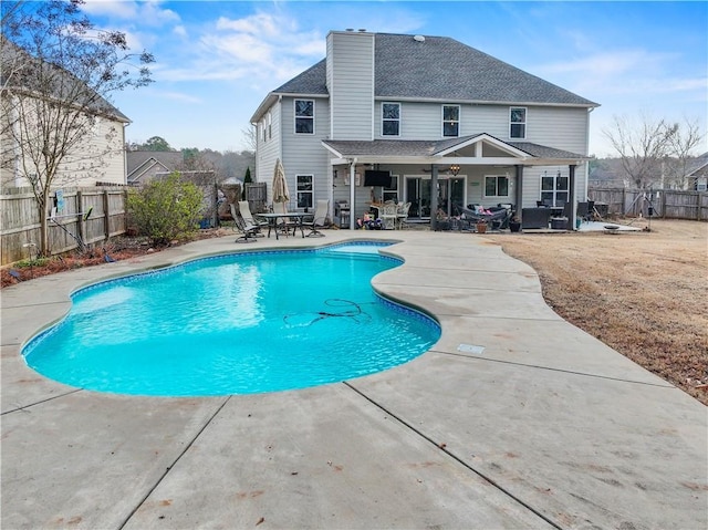 view of swimming pool featuring a patio